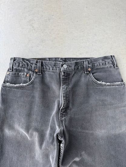 90s Levi’s 560 Faded Black Denim Jeans [35x32]